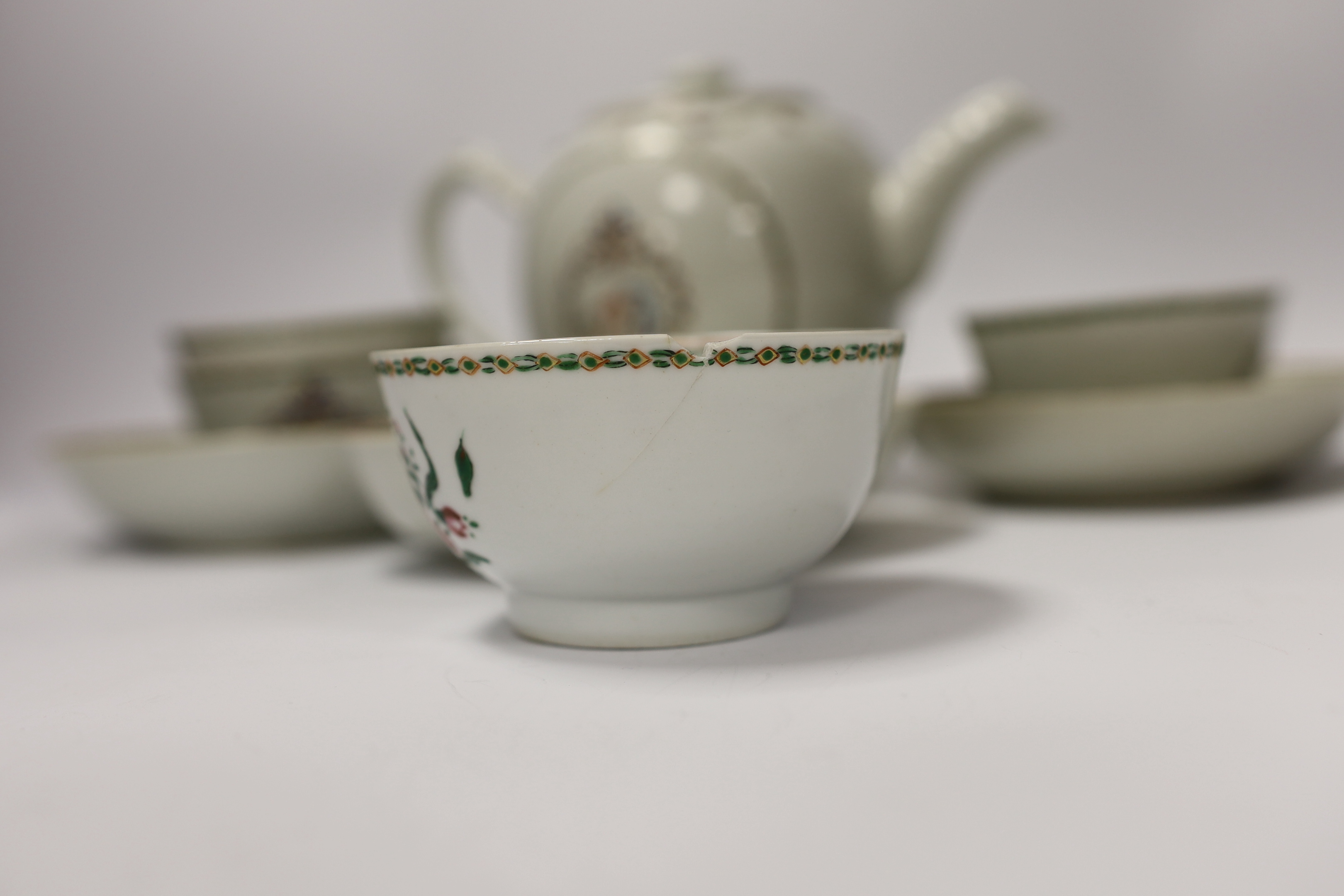 A Chinese export famille rose teapot, four tea bowls and three saucers, all Jiaqing period